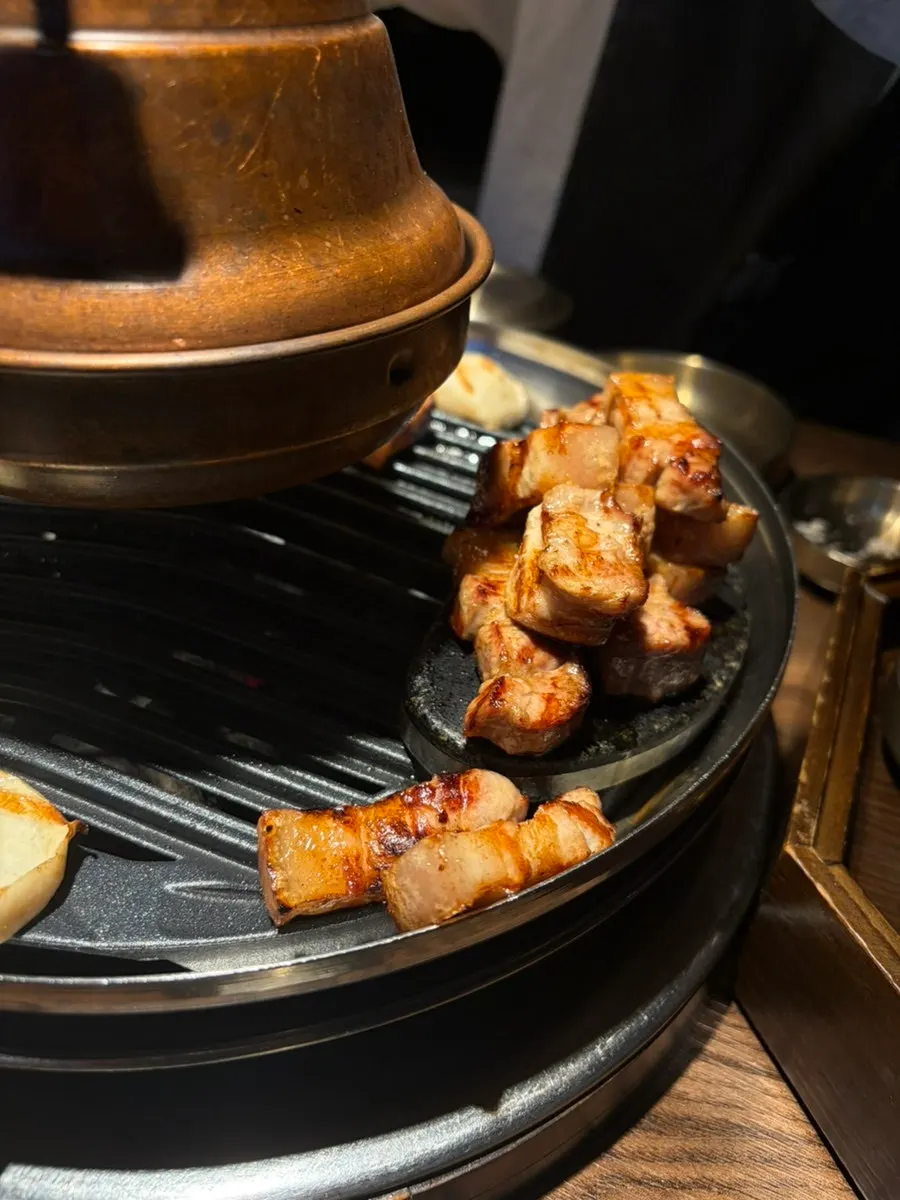 A piece of pork belly grilled with crispy skin