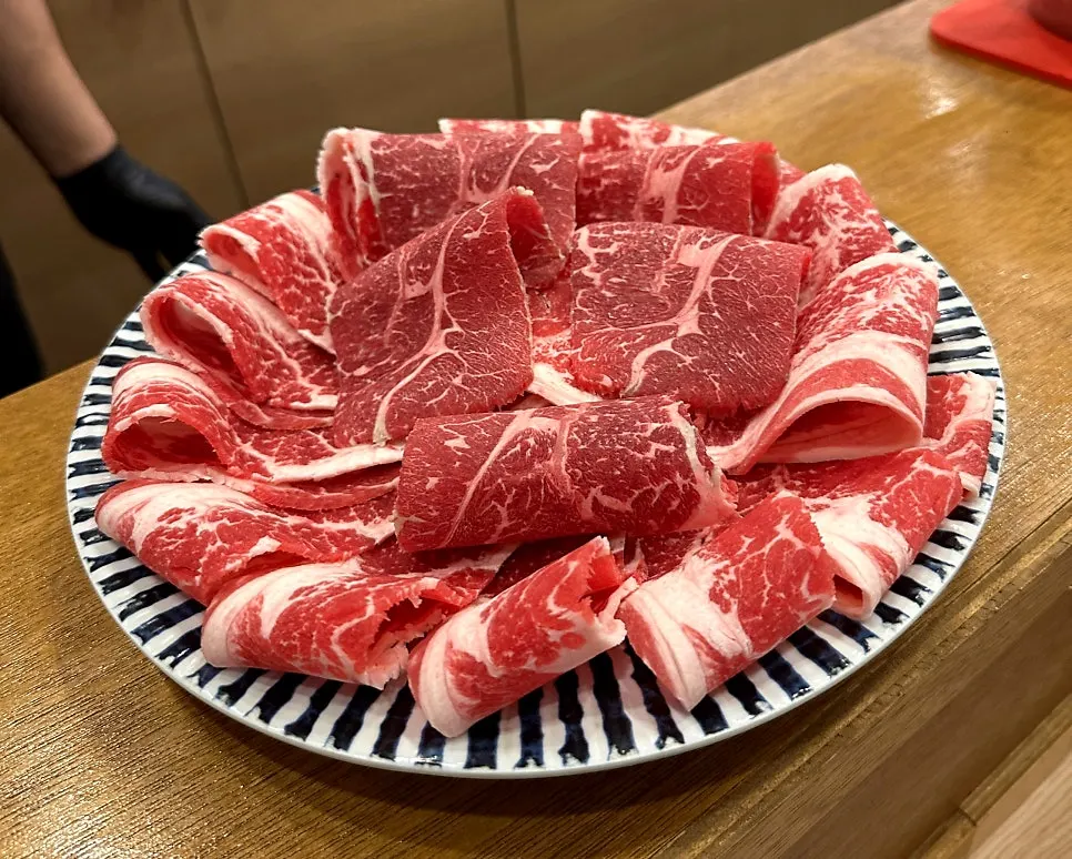 Black Angus beef plated like a blooming flower