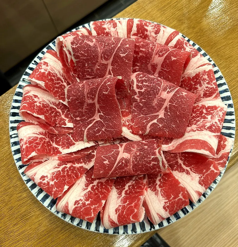 Brisket and sirloin cuts plated together