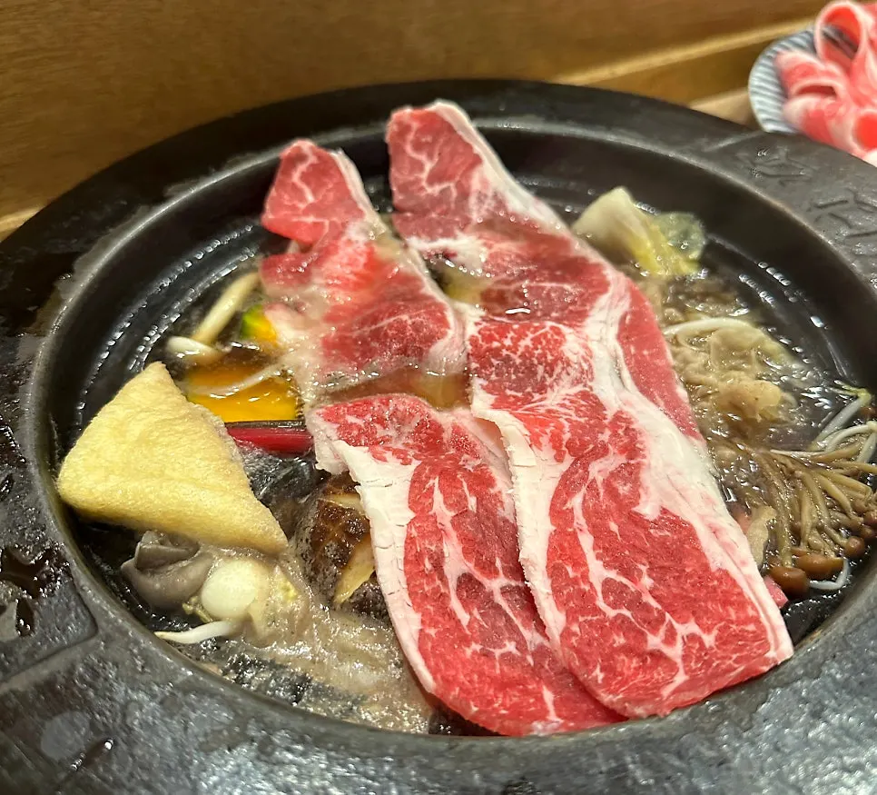 Plate of cooked beef and vegetables taken from the pot