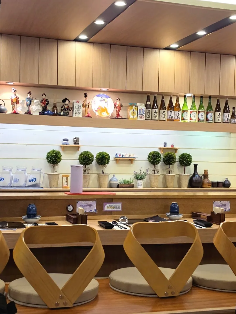 Interior of Hana Shabu Shabu with counter seats and table seats