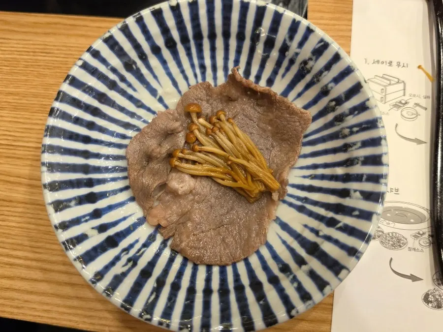 Shabu-shabu beef cooked to perfect doneness
