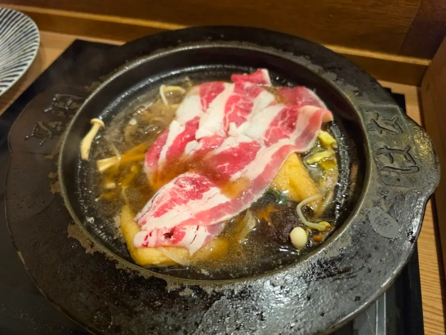 Cordyceps rolled up and dipped in sauce