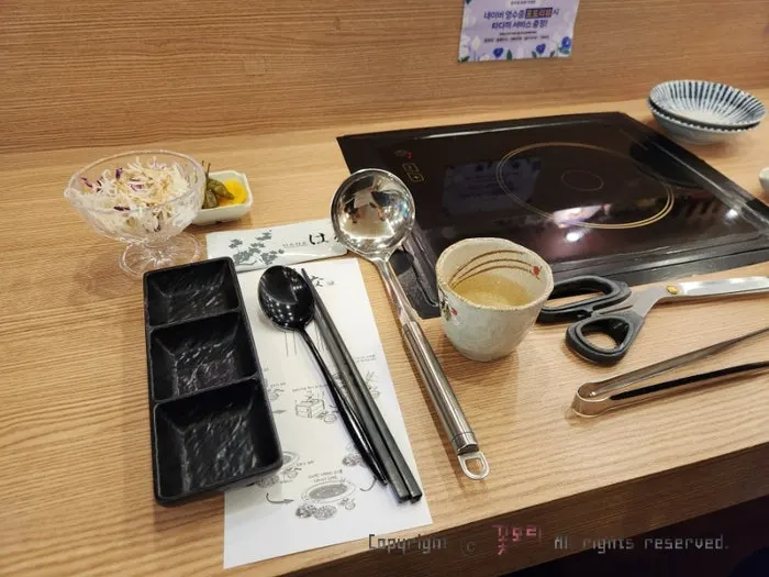 Starter salad and utensil setting