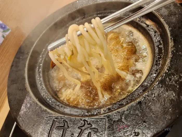 Cooking meat in the boiling broth