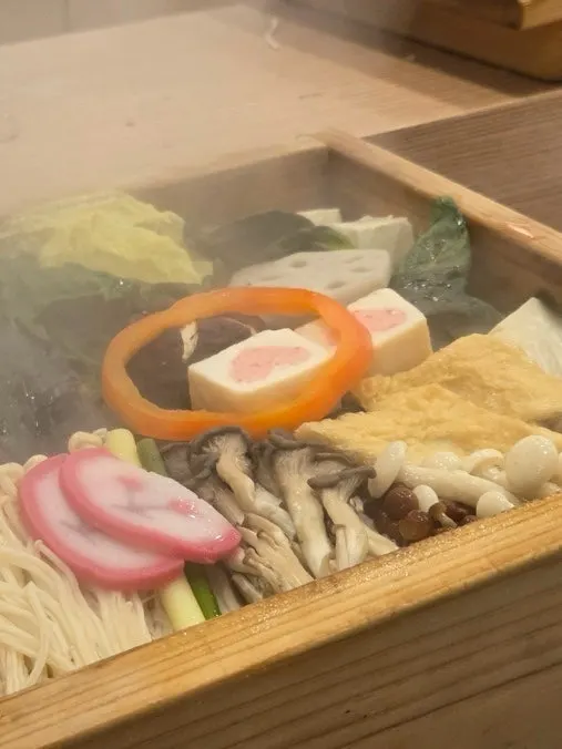 Meat and vegetables plated after coming out of the steamer