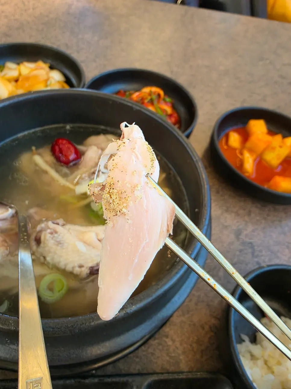 Samgyetang meat dipped in salt