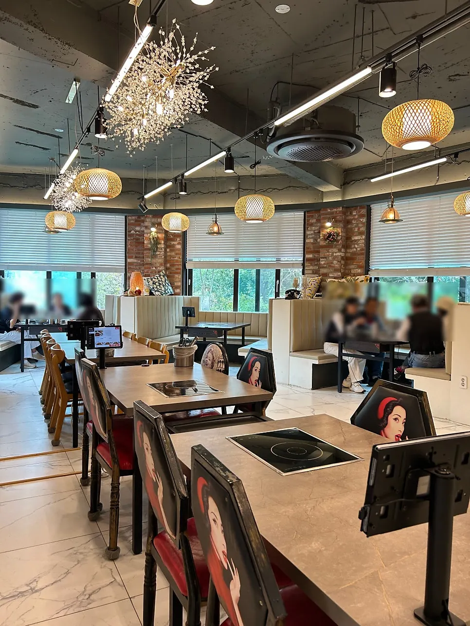 Airy jjukkumi restaurant interior with a high ceiling