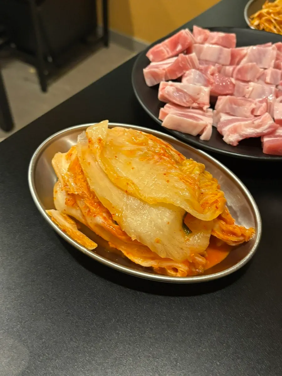 Well-aged kimchi served alongside the kimchi pork belly
