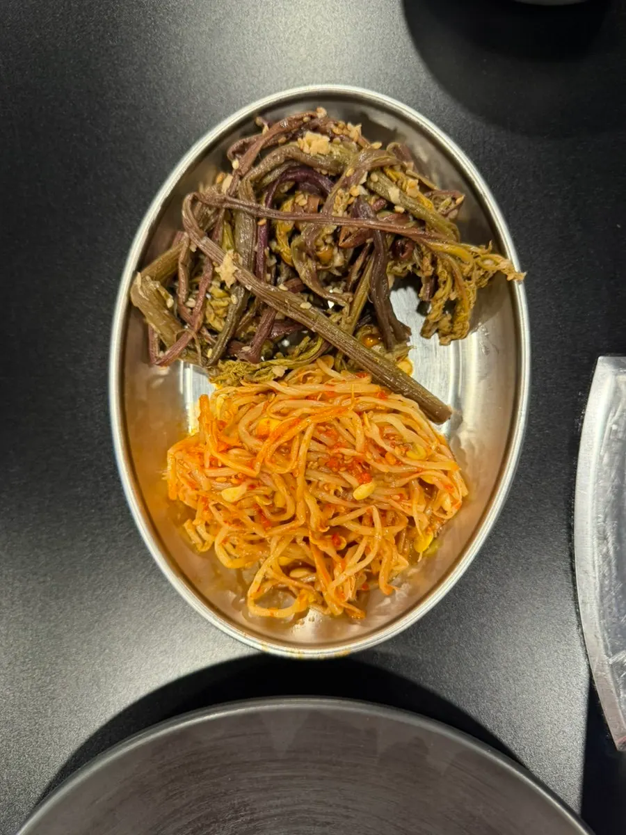 Self-serve bar with lettuce wraps, mustard leaf kimchi, and ssamjang