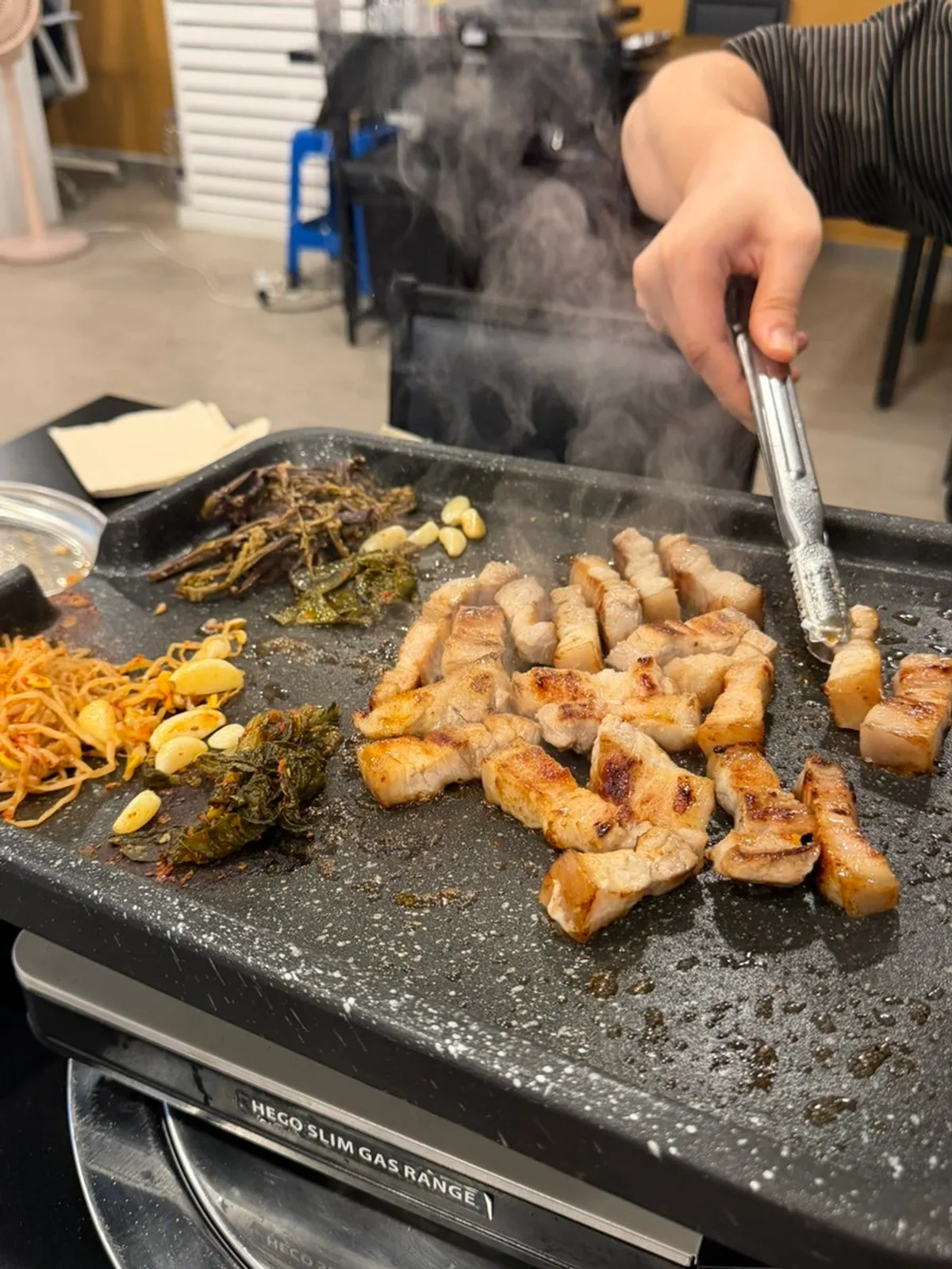 A finished spread of Jeju fresh pork on the Griddle Hall plate