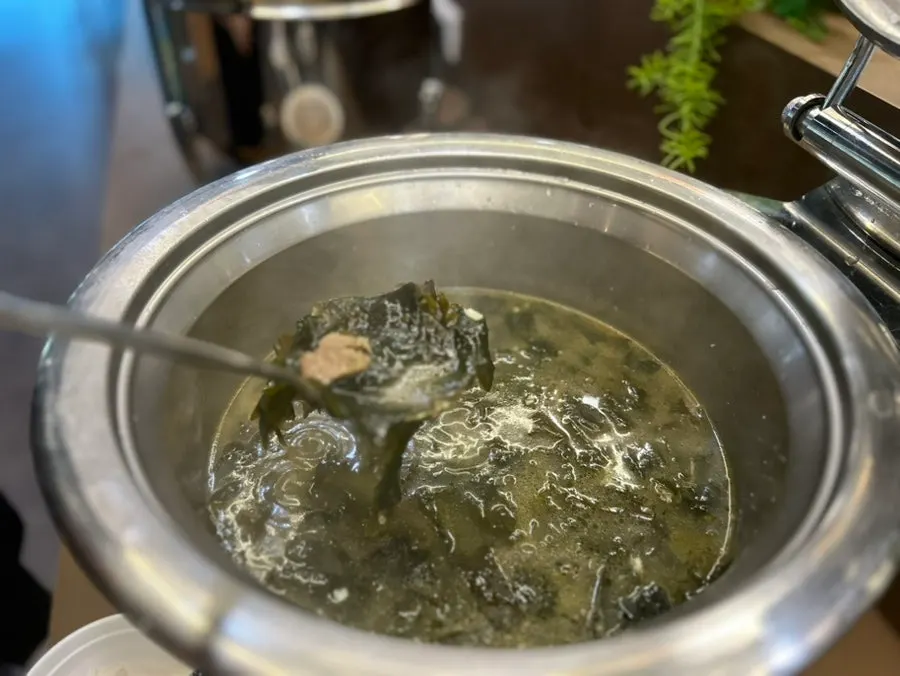 A bowl of seaweed soup, refilled twice