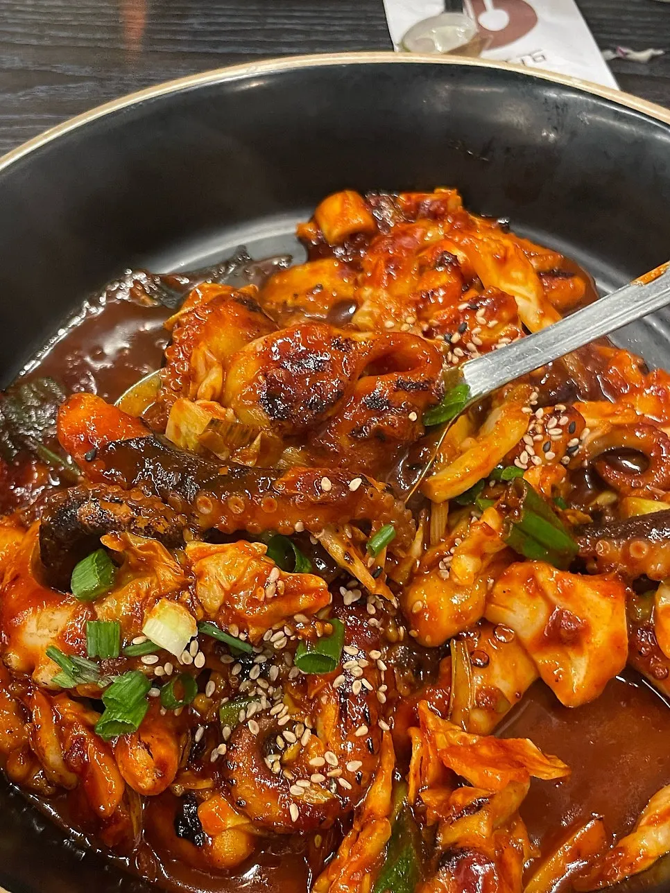 A plate of perilla oil jjukkumi in red sauce