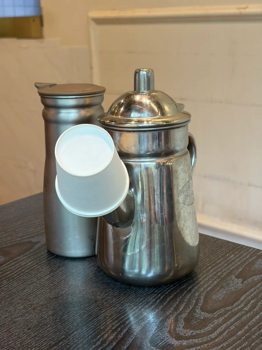 Kettle of hot water served with the hot pot rice