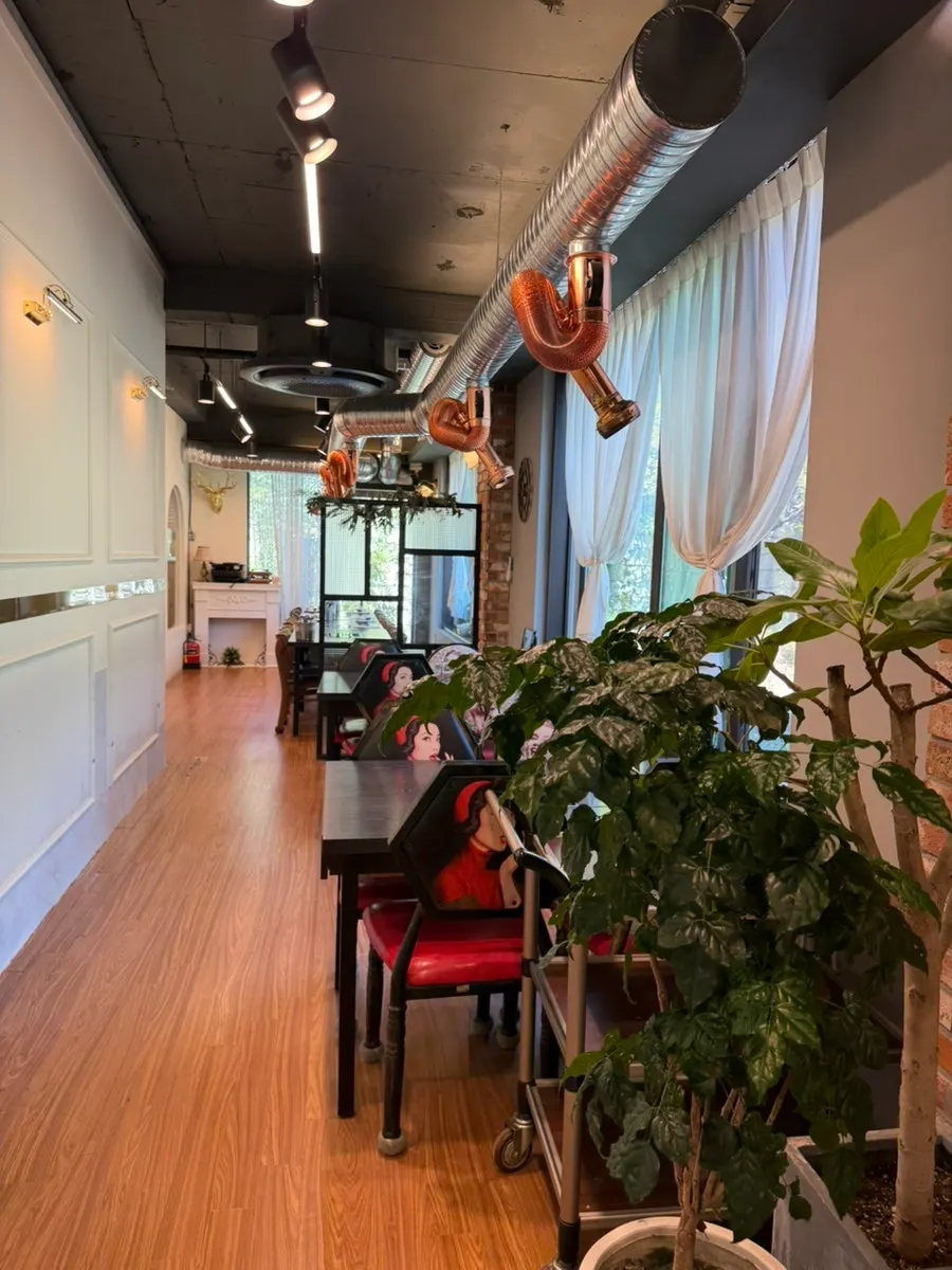 Restaurant interior with window-side tables