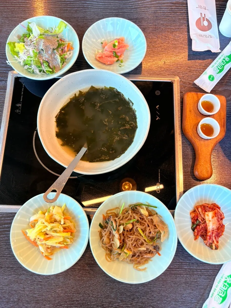 Side dishes including salted pollock roe and salad