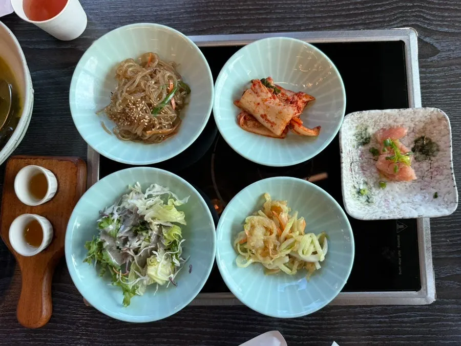 Banchan spread served with the set meal