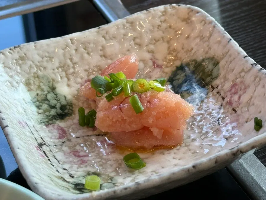 Close-up of the jjukkumi set's banchan