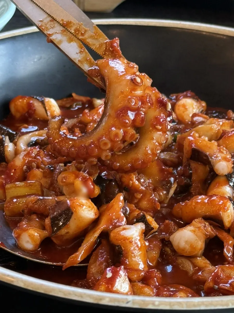 Close-up of spicy perilla-oil jjukkumi in sauce
