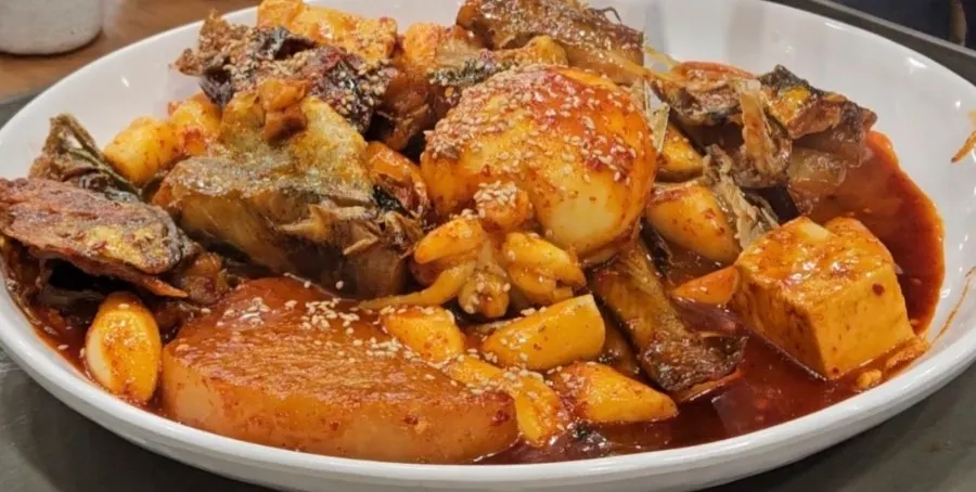Cuttlefish topping added to the braised pollock
