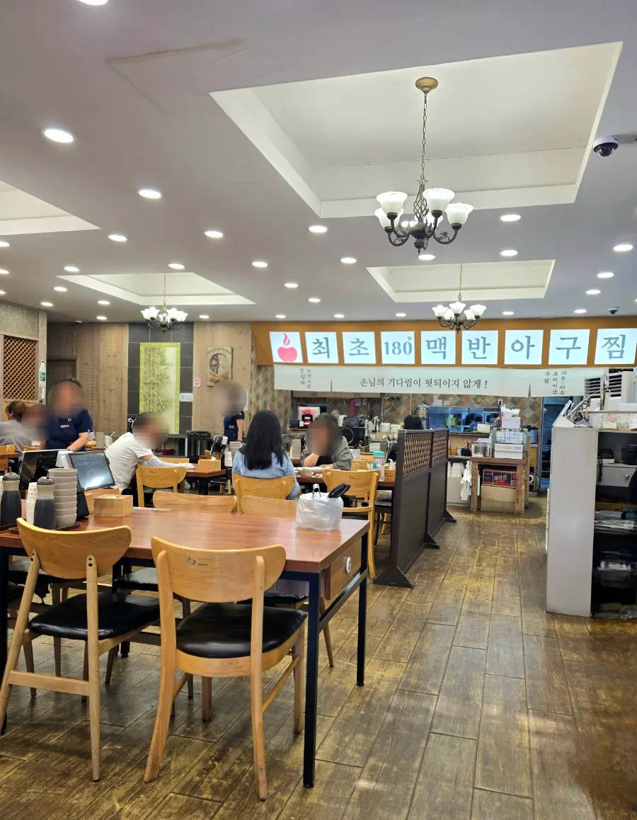 Spacious interior of Appa Jjim Main Branch with roomy table spacing