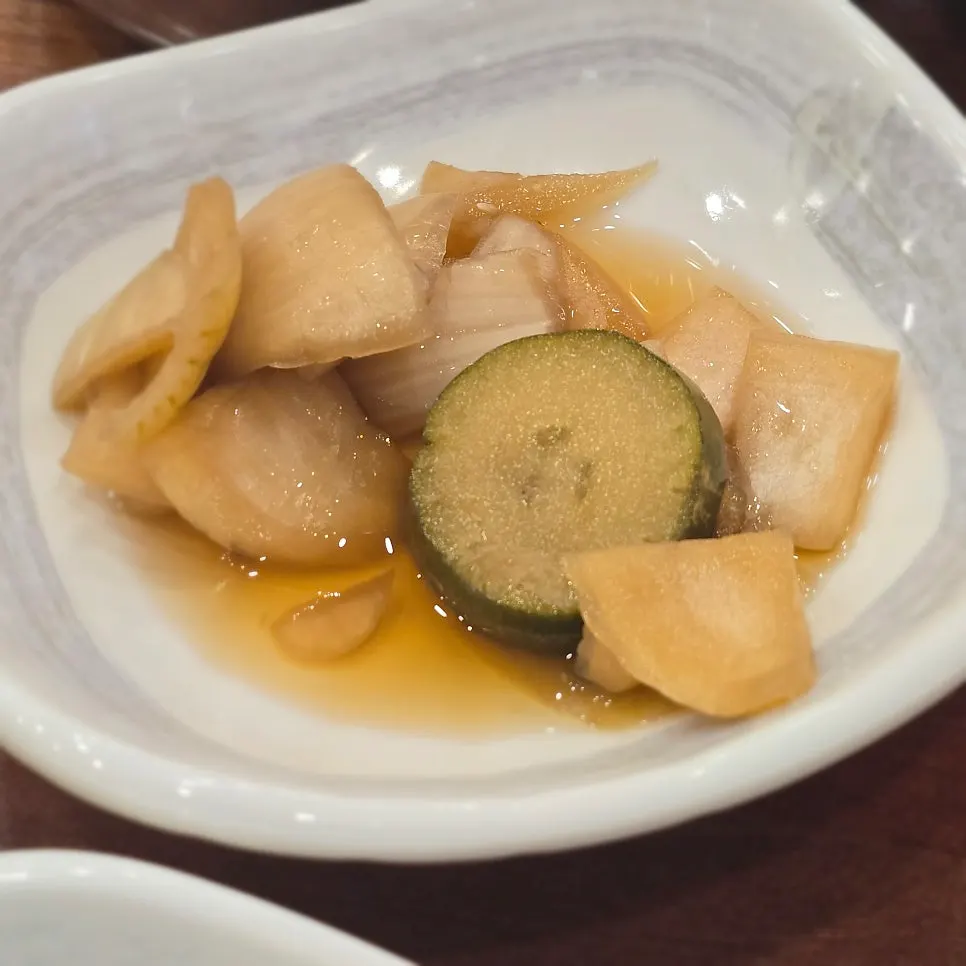Basic side dish, pickled onion at Appa Jjim