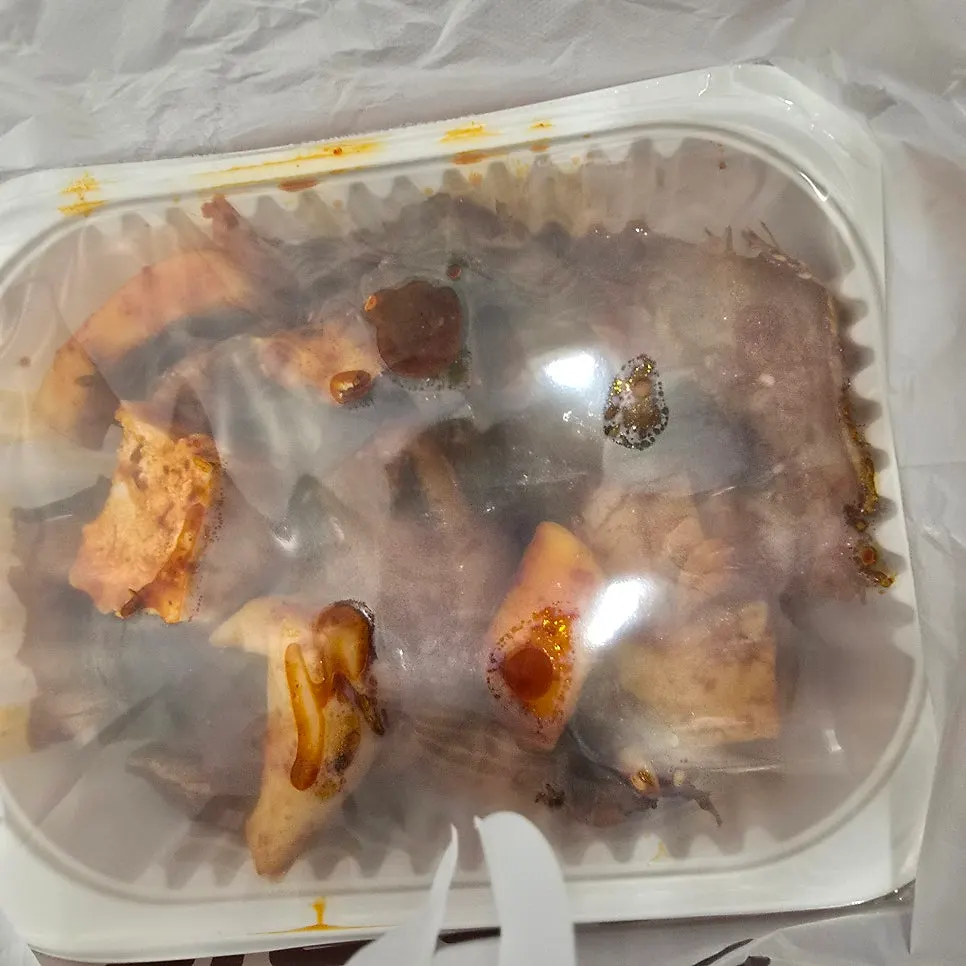 Braised pollock sealed in a dedicated takeout container