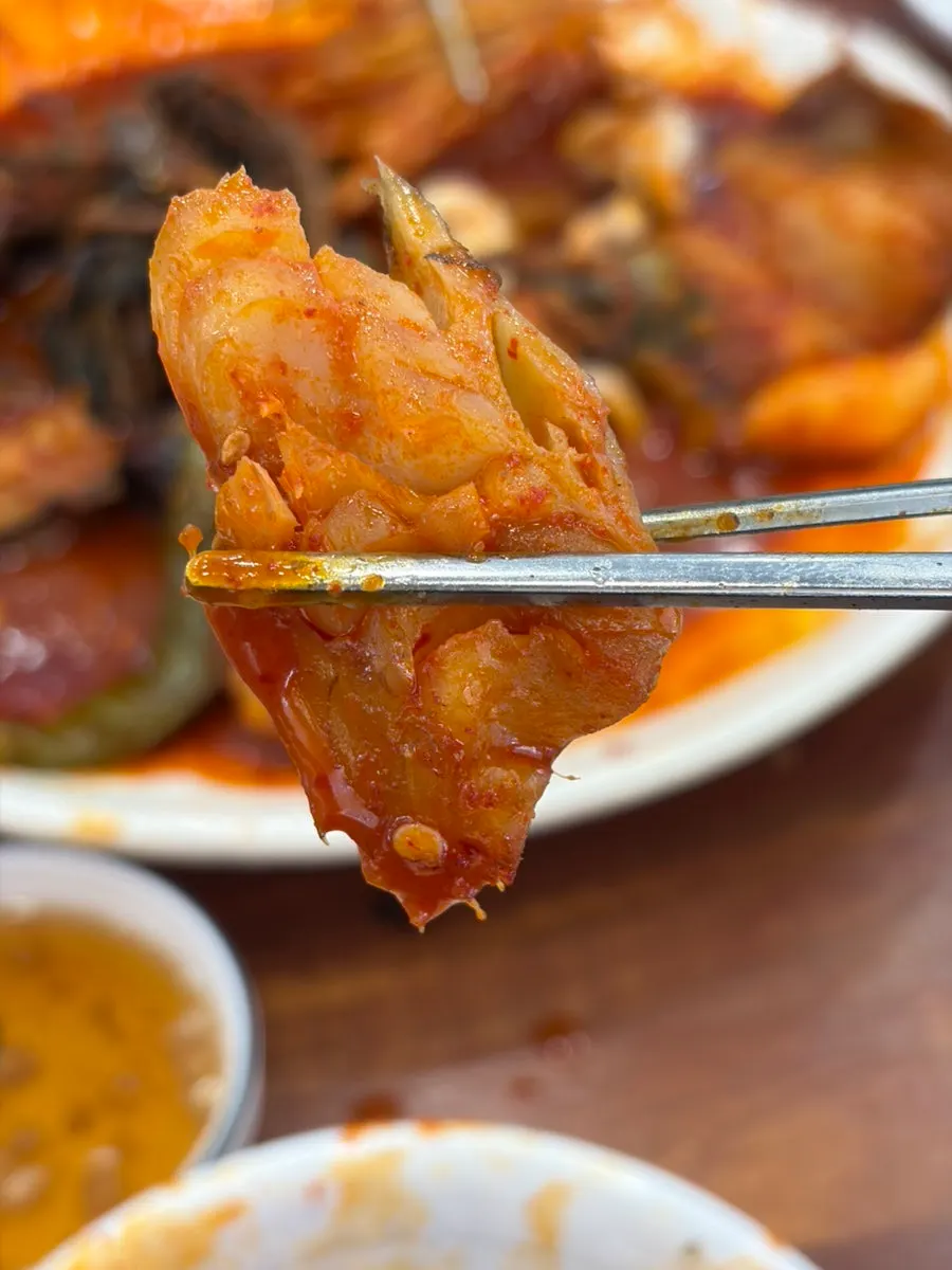 Pollock meat coated in sauce