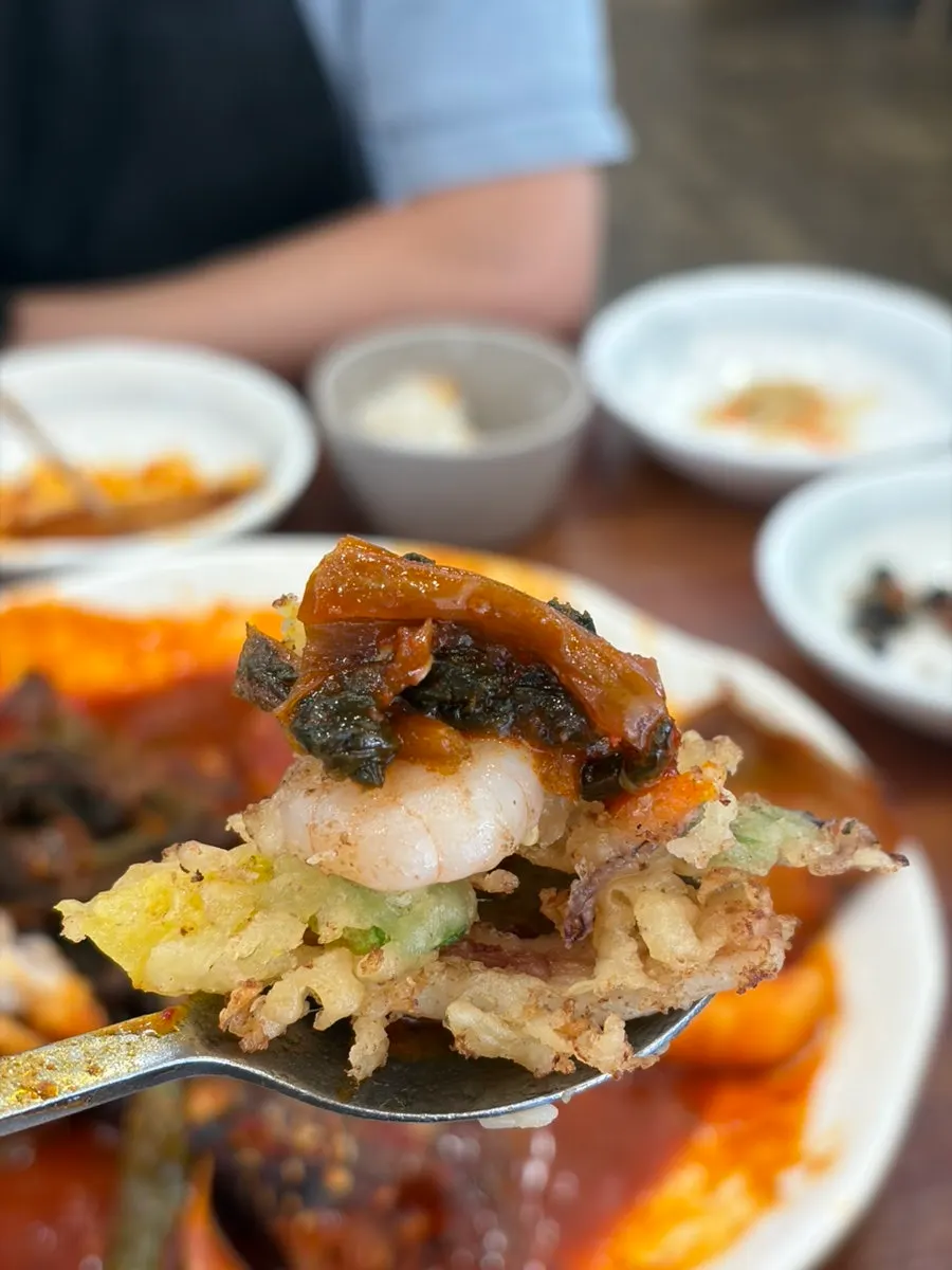 A three-way bite of pollock and dried radish greens