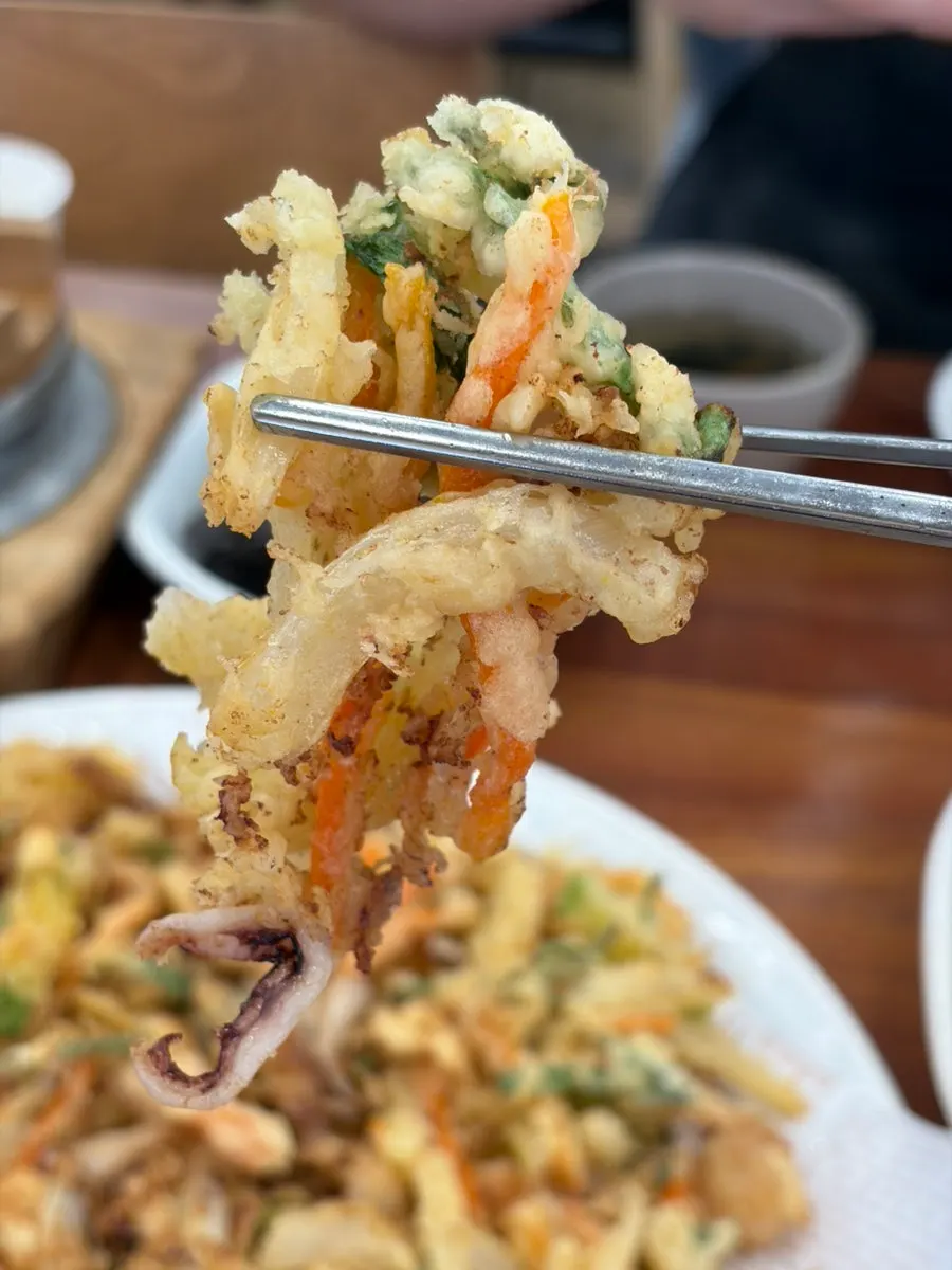 Cross-section of the seafood pancake packed with squid