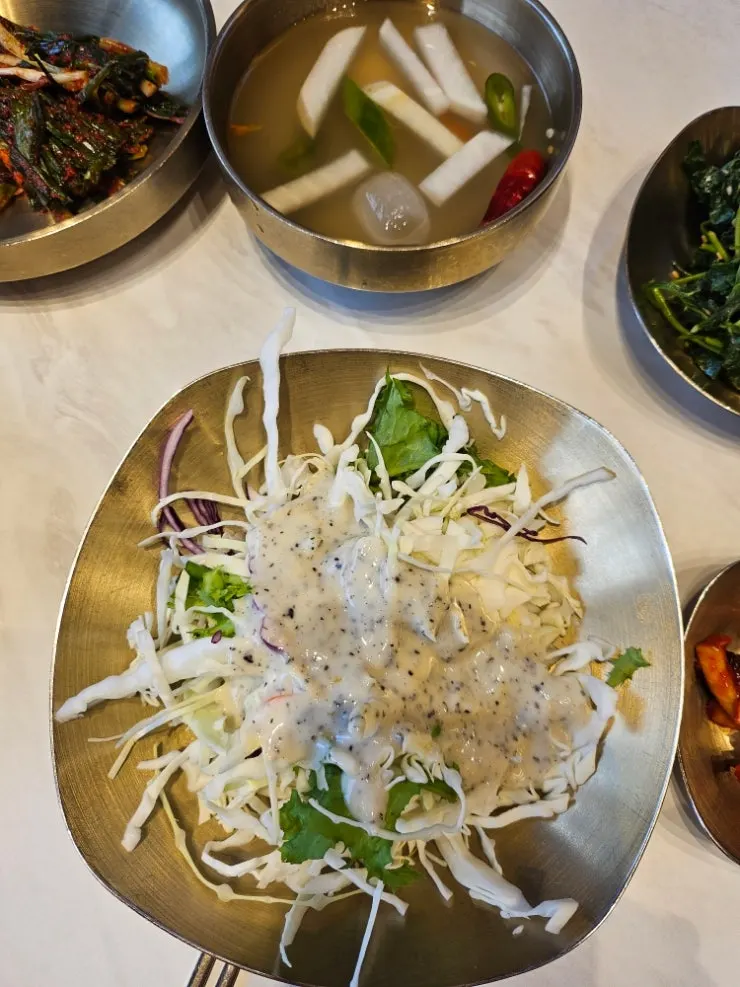 Kimchi served alongside the rice soup