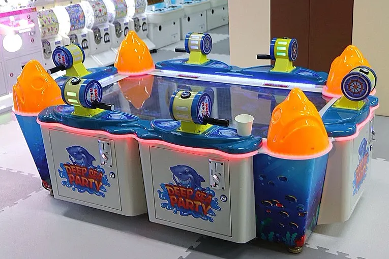 Arcade games and claw machine corner in the kids' room