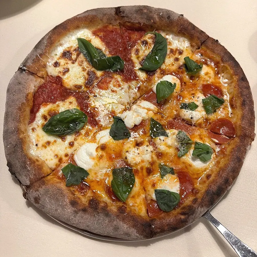 Half-and-half wood-fired pizza order