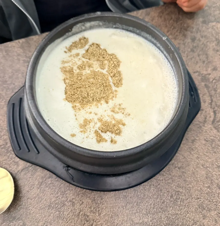 Three samgyetang dishes on the table at Baekheukdam