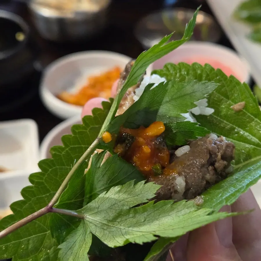 A bite of beef bulgogi ssambap