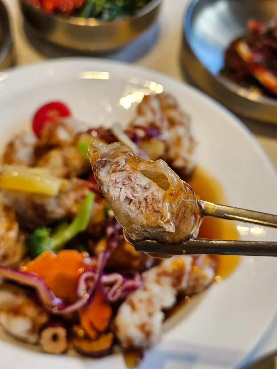 Crispy fresh tenderloin tangsuyuk served with sauce on the side
