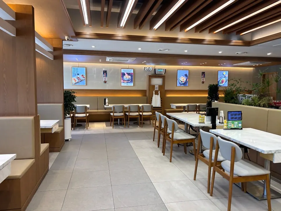 Spacious, bright dining hall inside the restaurant
