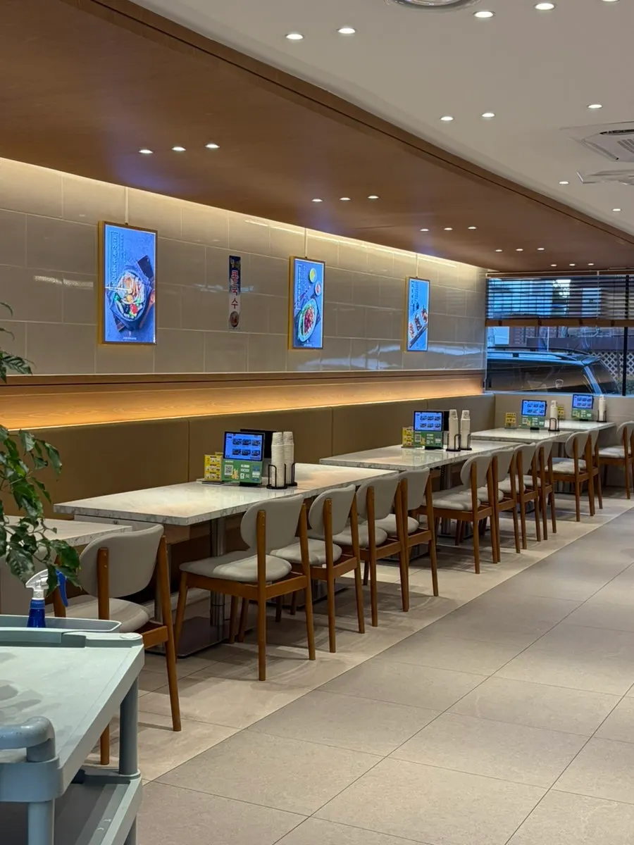 Spacious wood-tone restaurant interior