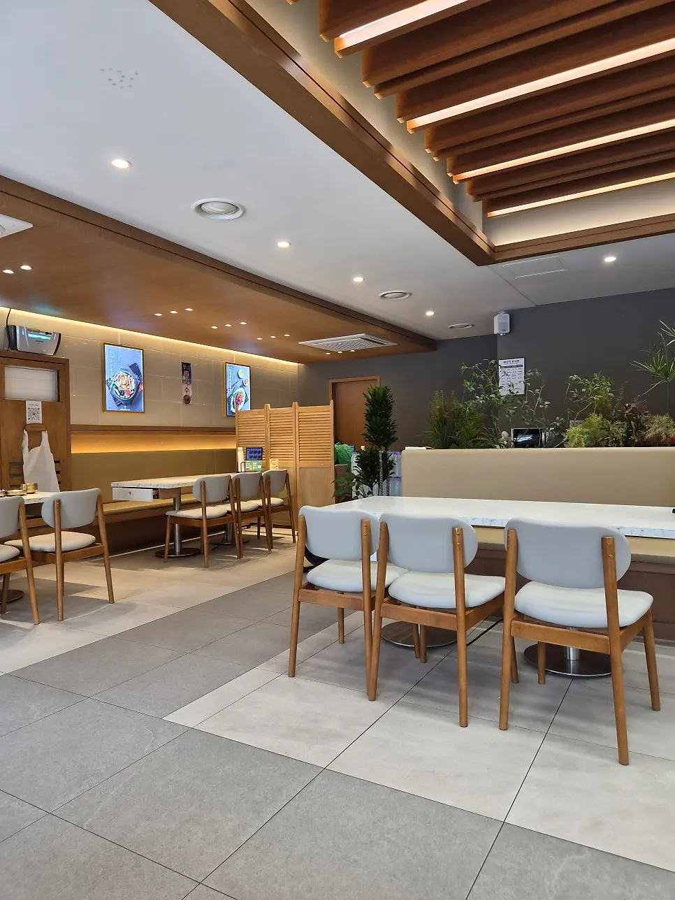 Interior with generous space between tables