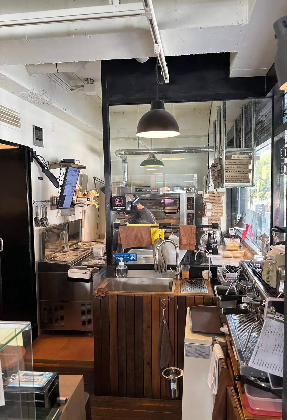 Interior styled like a neighborhood pizzeria abroad