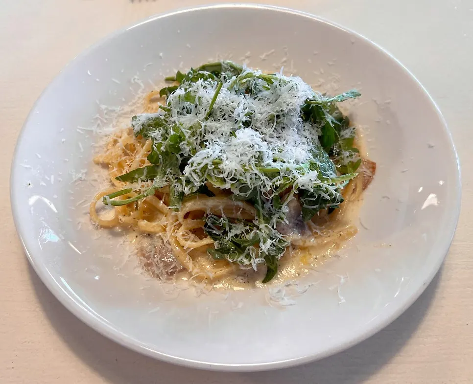 A plate of truffle mushroom cream pasta