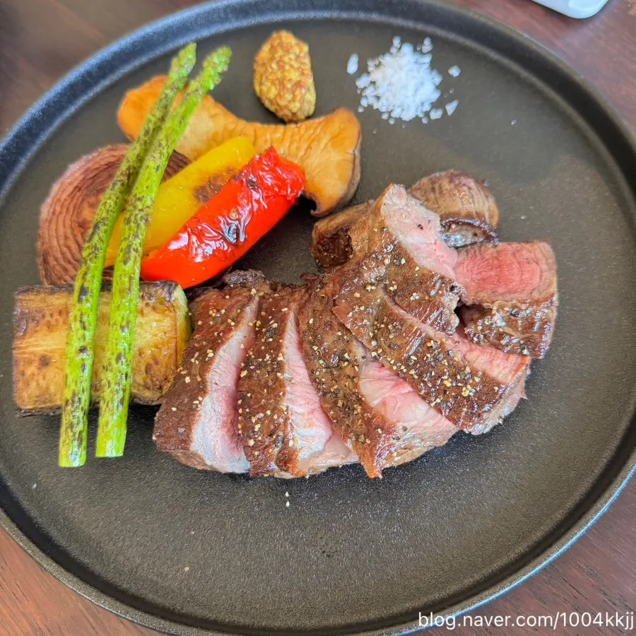 Korean beef striploin steak with grilled vegetables at Bokkeriu