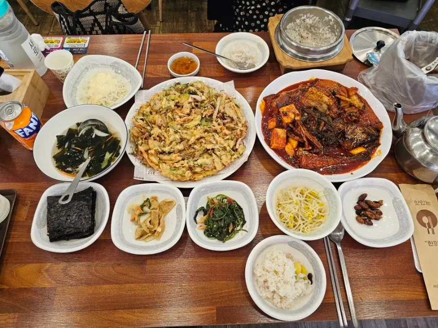 Full table spread of braised pollock at Appa Jjim Main Branch