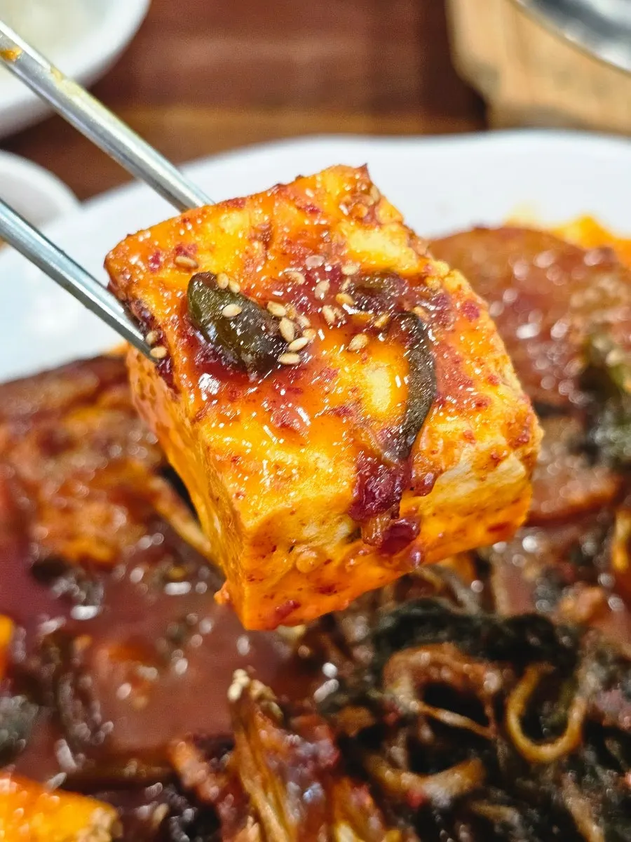 A seasoned piece of braised pollock