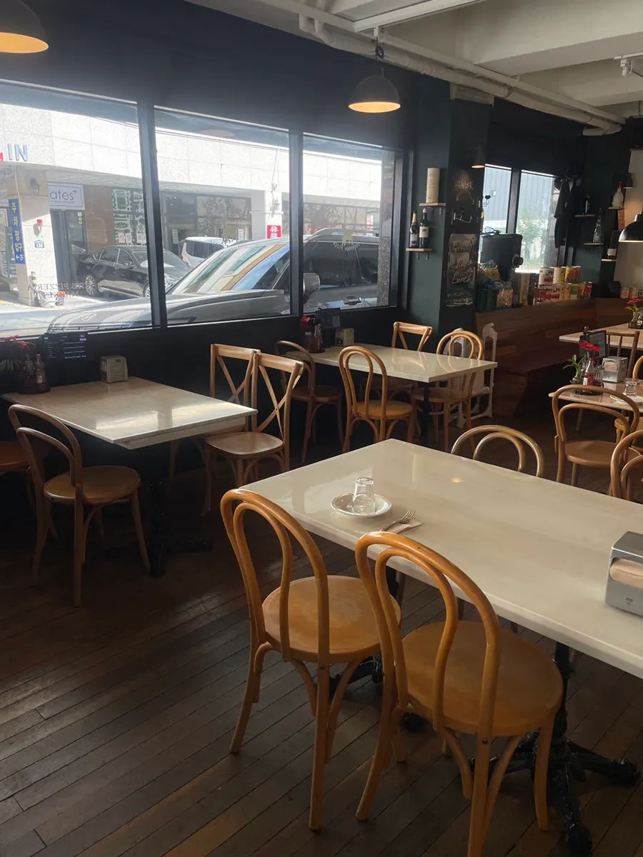 Cozy indoor seating at The Pizzeria Market Hanam Misa
