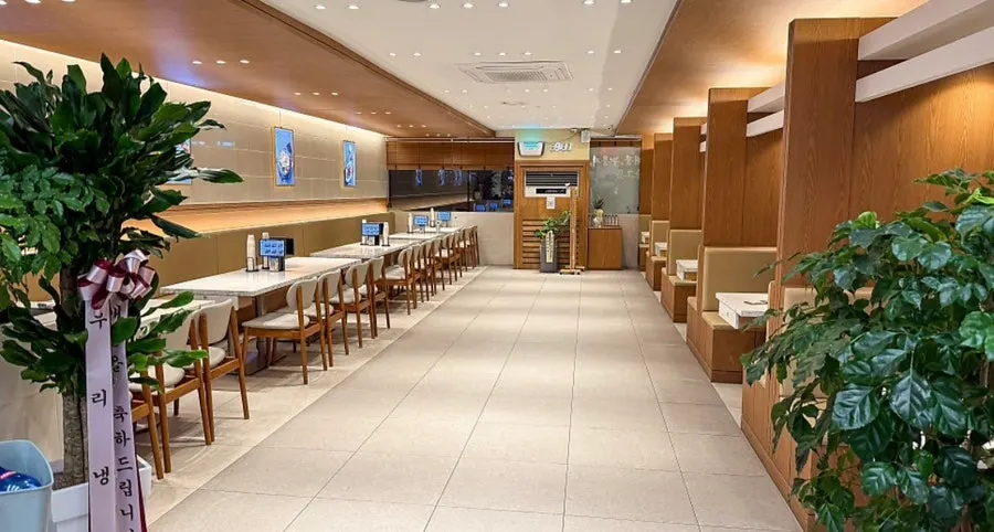 Front view of the restaurant with parking space in front