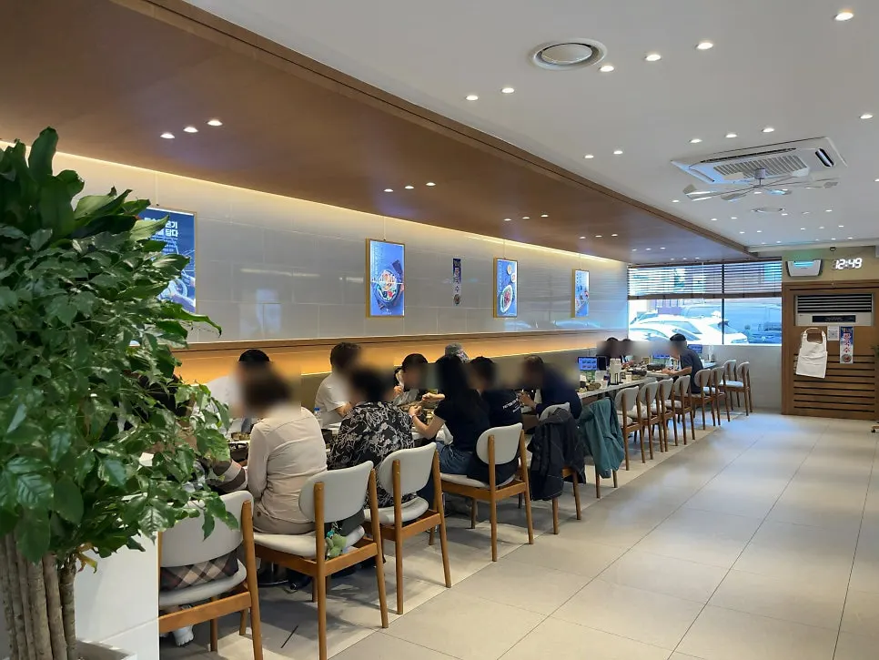 Interior seating with window-side sofa seats