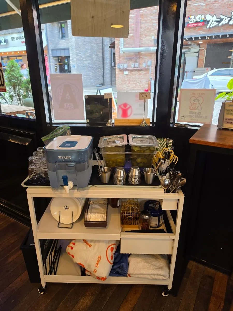 Self-serve bar corner near the entrance