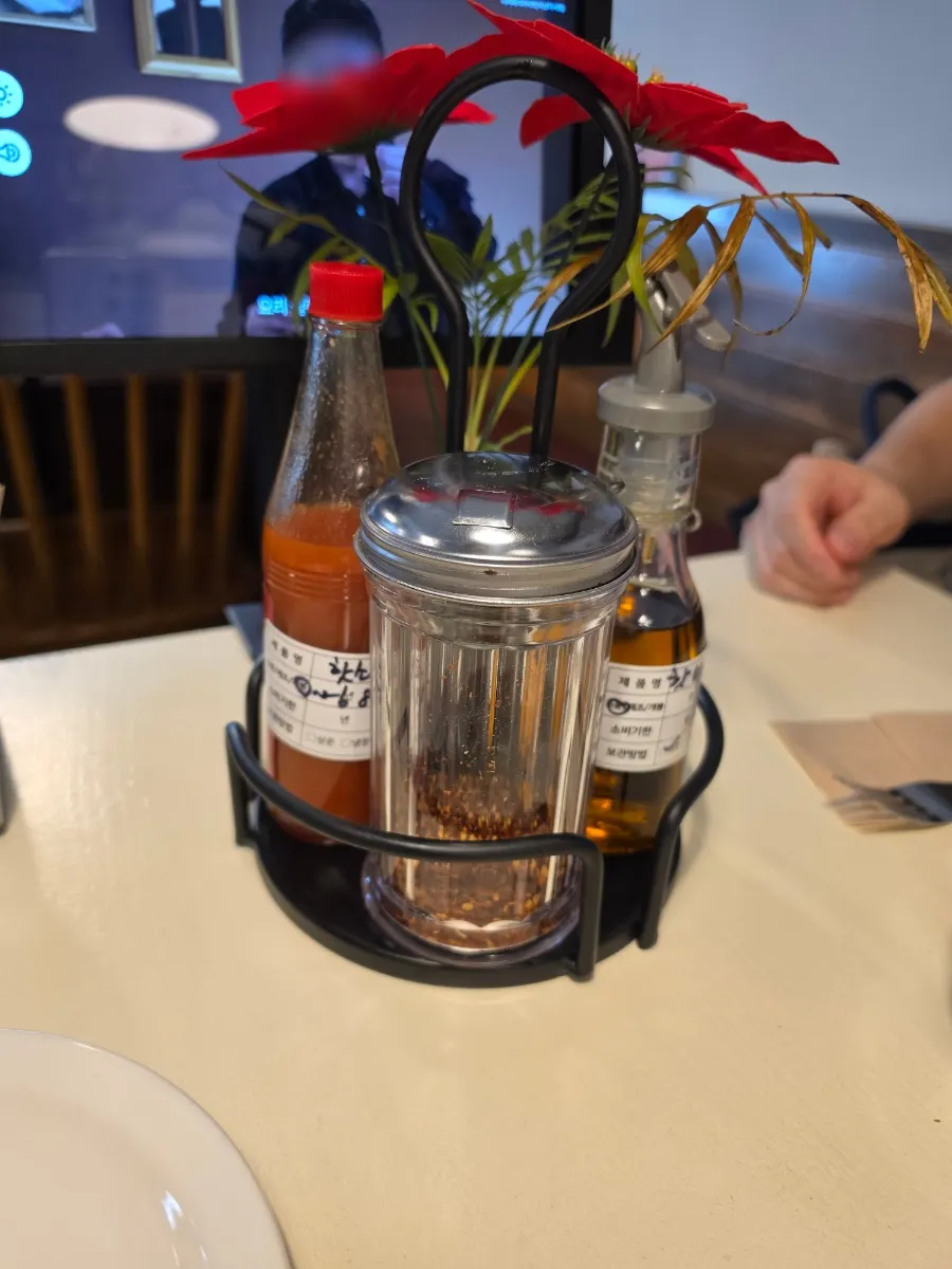 Water, pickles, and jalapeños brought from the self-serve bar