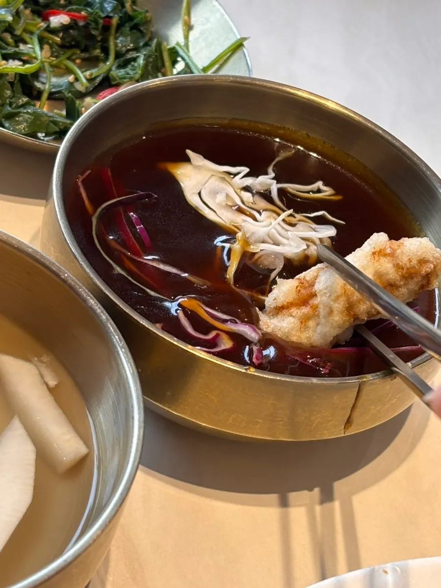 Picking up a piece of tangsuyuk